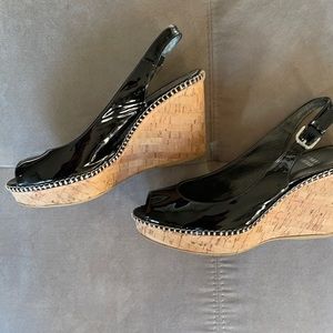 Stuart Weitzman wedge heel platform.